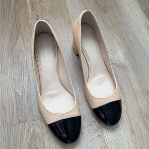 Cole Haan Two-Tone Cap Toe Block Heel Pumps in Nude and Black
